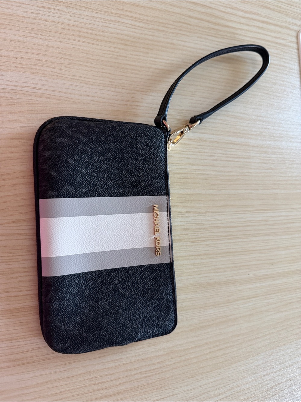 Michael Kors Black Wristlet with White and Gray Stripe